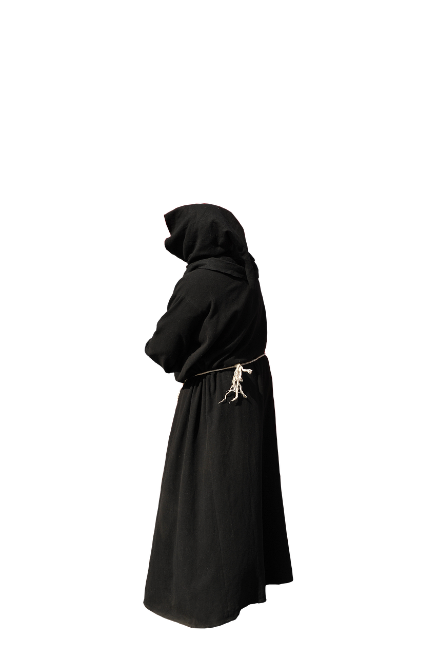 the image shows a person wearing a black robe with a hood, likely a monk or religious figure. the background is black. the robe is tied at the waist with a white rope. the person is standing in a position that is turned away, with their head bowed.