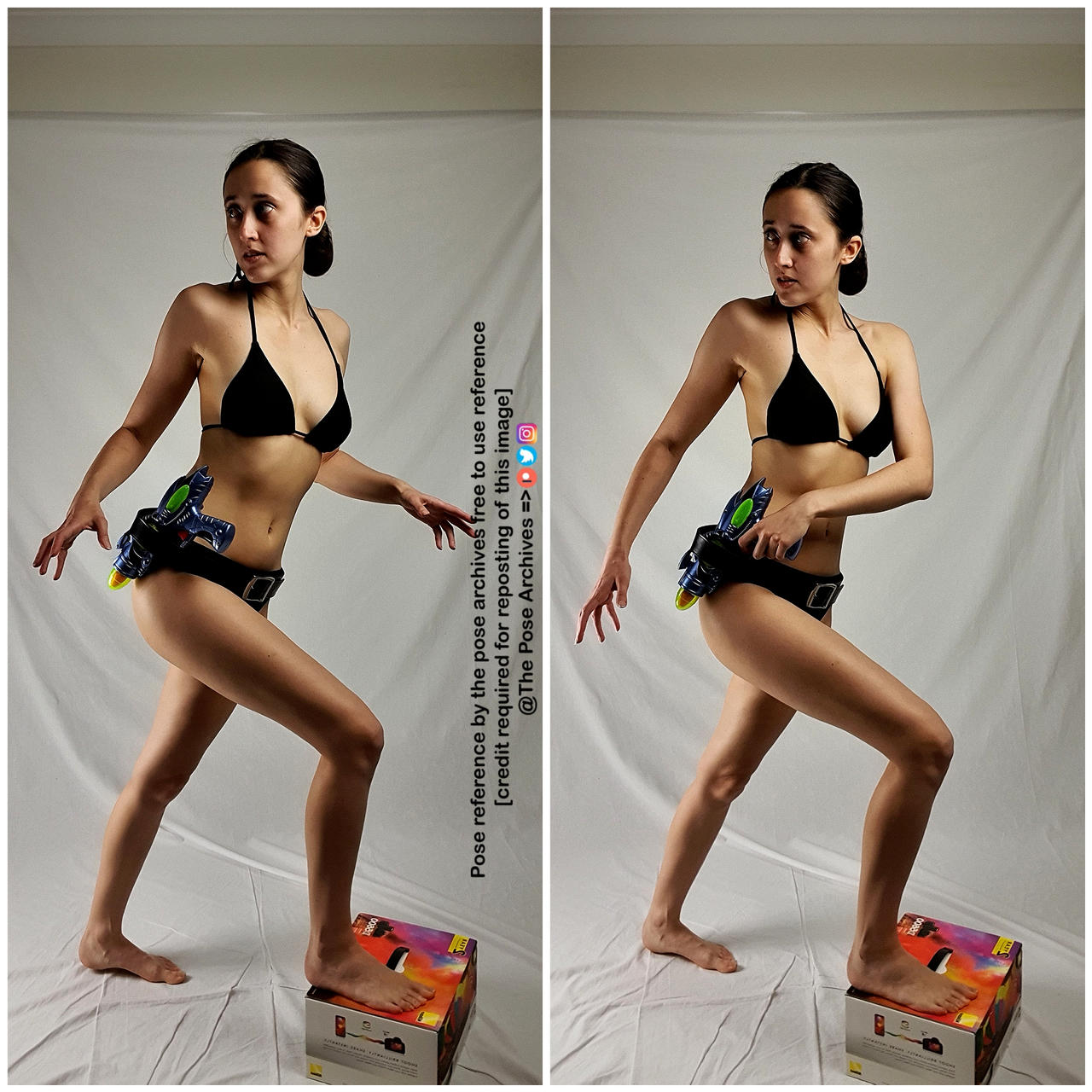 a young woman in a black bikini stands in a dynamic pose against a white background, holding a toy ray gun. she is positioned slightly offcenter, with her weight shifted to one leg. the lighting is bright and even, casting soft shadows. a small cardboard box is visible near her feet. the overall composition suggests an action scene, potentially for artistic reference.