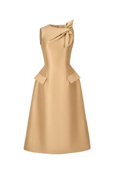 a gold sleeveless dress with a bow at the neckline. the dress has a fitted bodice and a flowing skirt. the skirt is fitted at the hips and then flares out. the dress is perfect for a special occasion or a night out.