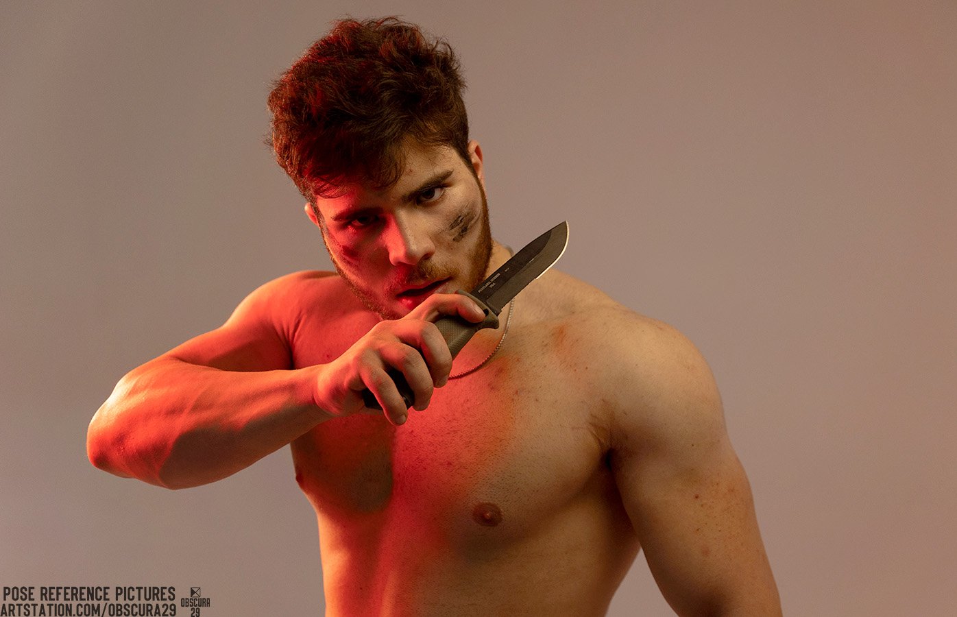 a muscular man is standing shirtless in front of a