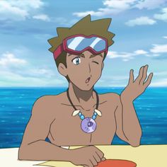 a cartoon man with brown hair and tanned skin is shown from the waist up. he is wearing swimming goggles on his head, a necklace, and is propping himself up on a surfboard on the beach. the ocean and sky are visible in the background.