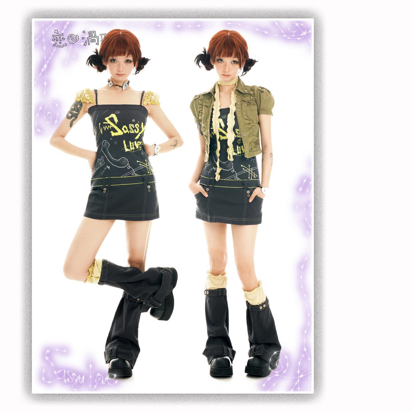 the image shows two identical young asian women wearing similar outfits.  they both have short brown hair, similar makeup, and are wearing dark gray/black mini dresses with yellow accents.  they are wearing tall black boots that reach their knees.  one woman is slightly angled to the left, while the other is more centered. both are wearing similar necklaces and are posed against a white background with a purple decorative border around the edges.  the overall style is a blend of alternative, punk, and potentially lolita fashion influences.