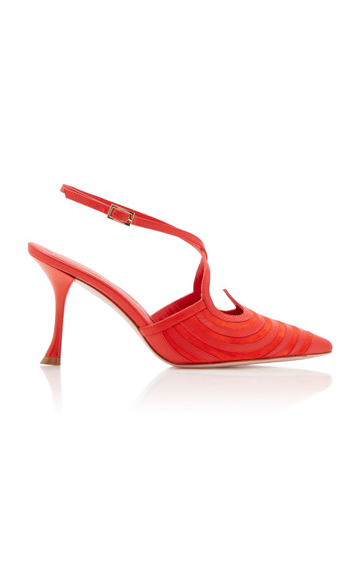 a pair of red stiletto heels with a pointed toe and an ankle strap. the shoes are made of suede and leather and have a high heel. they are a stylish and elegant choice for a special occasion. the shoes are sitting on a white background.