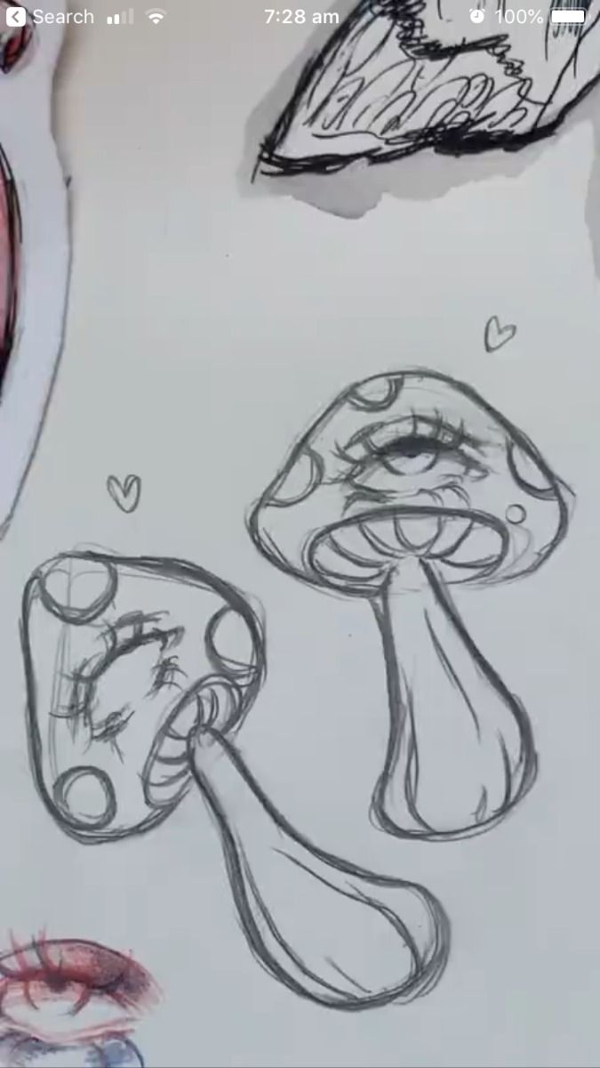 the image shows a closeup view of a handdrawn sketch on paper.  the sketch features two stylized mushrooms.  each mushroom cap has a large, single eye drawn on it, giving them a whimsical and slightly psychedelic look. the mushrooms have a cartoonish style with simple lines and shading.  small hearts are drawn near the mushrooms, adding to the whimsical and cute feel. there is also some other sketchy artwork visible in the background including what looks like eyes and possibly a jaw.  the overall style of the drawing is loose and expressive. the sketch is done in pencil or charcoal in grayscale.