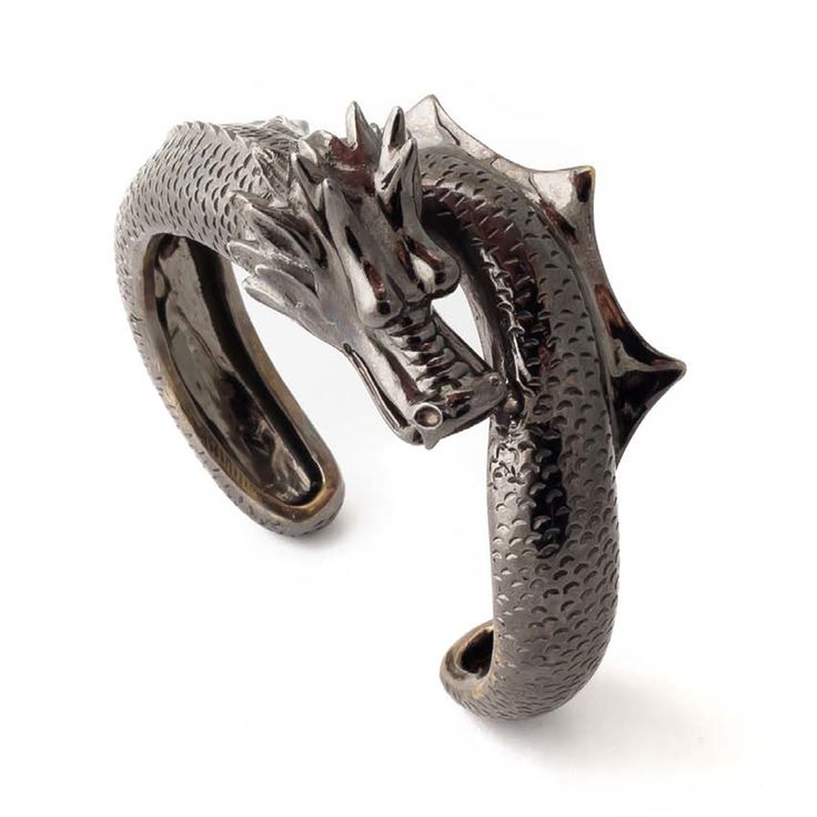 a black metal dragon bracelet. the dragon's head faces forward, with its body wrapping around the wrist. the bracelet is textured and has a shiny finish.