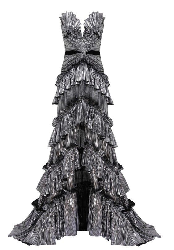 a fulllength metallic silver gown with a vneckline, a black waistband, and pleated, tiered ruffles throughout the skirt.