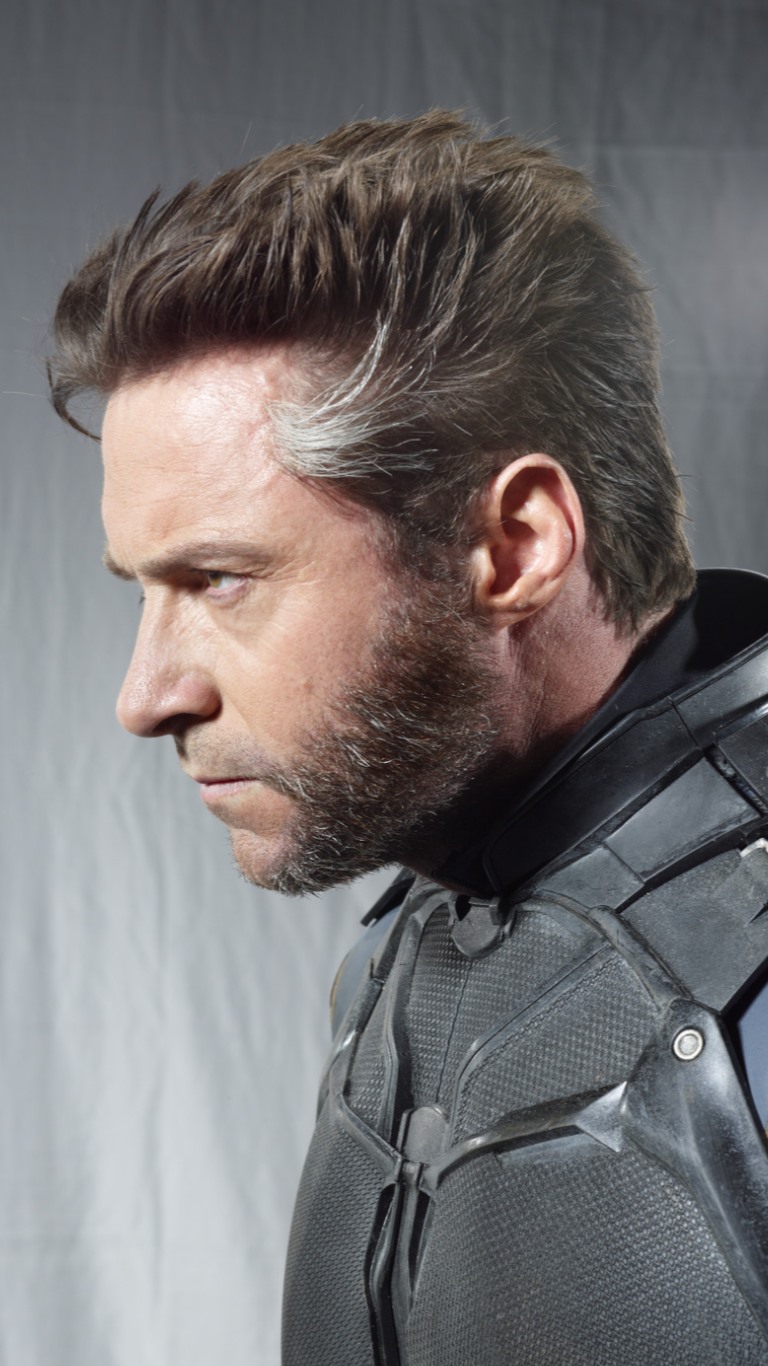 a side profile portrait of hugh jackman as wolverine in an xmen movie. he has a salt and pepper beard and gray hair. he is wearing a superhero costume.