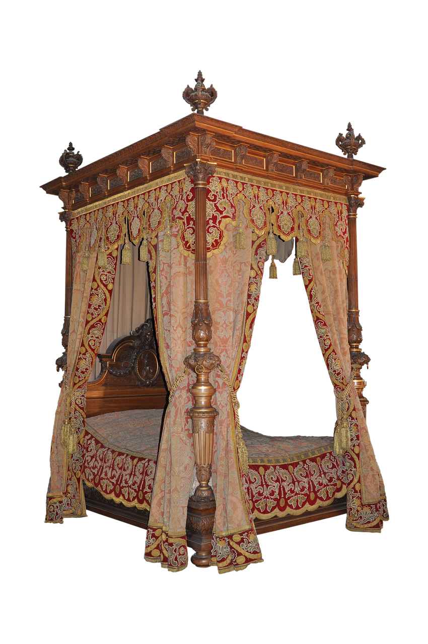 an ornate antique four poster bed with a canopy and patterned curtains is centered in the image against a black background. the bed frame is made of dark wood with intricate carvings and crowned finials on each of the four posts. the canopy is decorated with patterned fabric and tassels. the bed is draped with patterned curtains, adding to the luxurious and antique appearance.