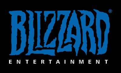 the blizzard entertainment logo is displayed on a black background. the text "blizzard entertainment" is in a bold white sansserif font with the word "blizzard" in blue. the "b" in blizzard has a jagged, bluegray outline.  the registered trademark symbol is displayed in the top right corner of the image.