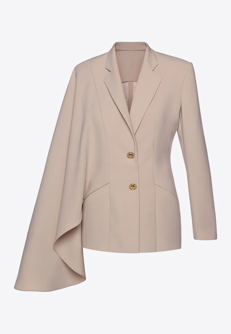 a beige blazer with a lapel collar and long sleeves. the blazer has two gold buttons and a capelike detail on one of the sleeves.