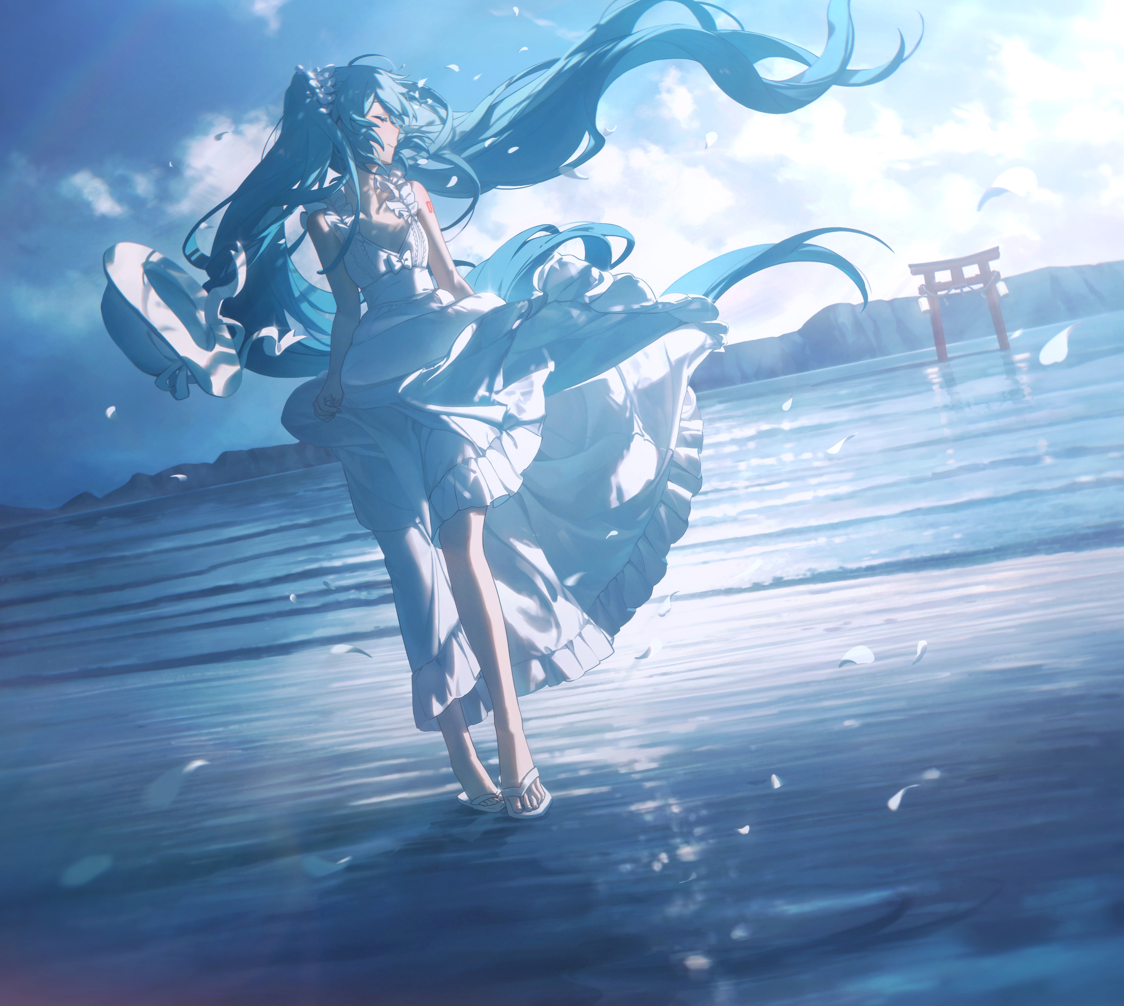 a digital artwork depicts the anime character hatsune miku wearing a flowing white dress and sandals standing on a beach with water. her long, blue hair billows in the wind. in the background, there's a torii gate visible. petals are scattered around. the scene has a bluetoned color palette and a dreamlike quality.