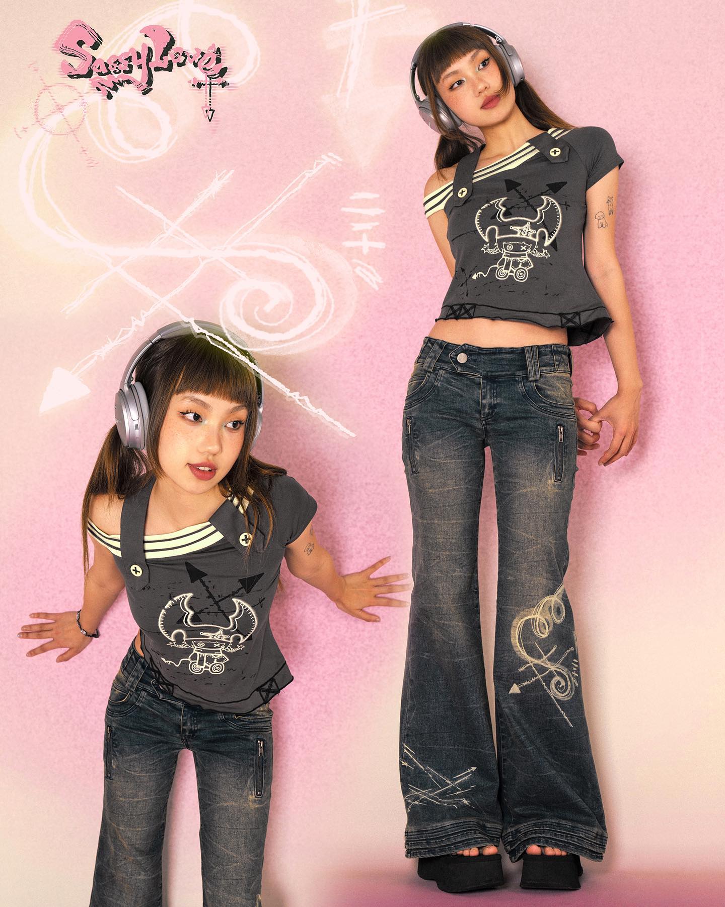 the image showcases two young women, possibly twins, modeling clothing from the brand "sassy loves." they are wearing matching outfits consisting of grey offtheshoulder graphic tshirts featuring a cartoonish robot design and distressed bellbottom jeans with additional graphic designs.  both are wearing large silver headphones and posing against a pastel pink background with stylized graphic elements. the overall aesthetic is heavily influenced by harajuku fashion and y2k trends, incorporating elements of vintage and 90s/00s styles.