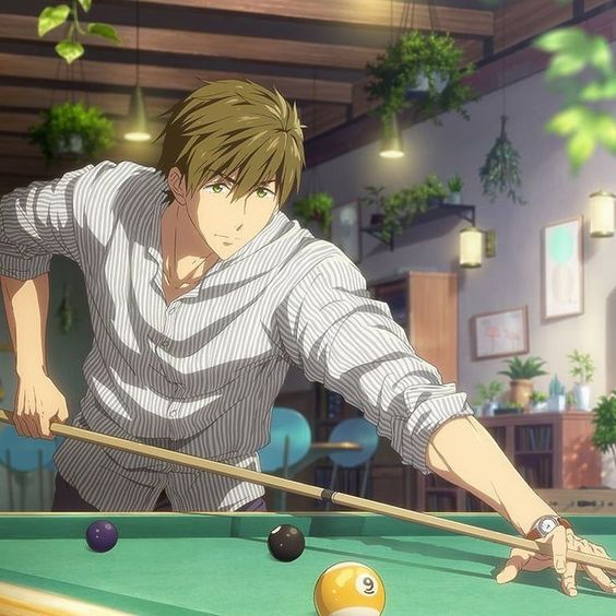 an anime character with brown hair and green eyes wearing a white and blue striped shirt is taking aim at a pool table. he's holding a pool cue in a dimly lit pool hall or cafe. there are hanging plants behind him.