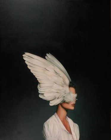 a woman with her face partially covered by a pair of white wings stares directly at the viewer against a dark background. her white dress and the delicate details of the wings create a sense of beauty and mystery.