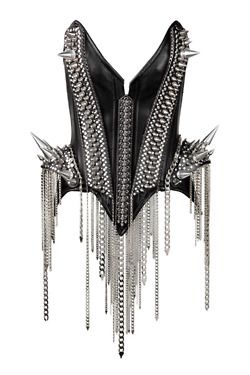 a black leather corset is adorned with silver spikes and chains. the corset has sharp spikes on the shoulders and at the top, while silver studs line the front and sides. multiple silver chains hang from the bottom, creating a dramatic and edgy look.