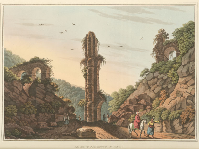 the image is a historical drawing or print depicting an ancient aqueduct in a landscape setting. the ruins of the aqueduct are prominently featured in the center and to the sides. there are figures or people present in the landscape, with one man on horseback accompanied by another person. the aqueduct is surrounded by trees, mountains, and other natural elements. birds are flying in the sky. the overall impression is one of travel, history, and the grandeur of ancient architecture in a natural setting.