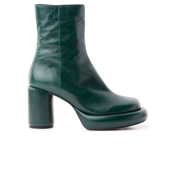 a pair of women's green leather ankle boots with a chunky platform heel. the boots are a dark emerald green and have a slightly squared toe. the heel is thick and blocklike, adding to the platform effect. the boots appear to be made of highquality leather, with a smooth finish and subtle texture.  the image shows a single boot angled to showcase its profile against a white background.