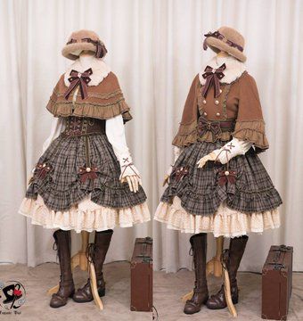 a front and back view of a woman modeling a lolita fashion outfit. she is wearing a brown dress with a floral pattern, a white blouse with lace trim, a brown cape with faux fur trim, a brown hat with faux fur trim, brown boots, and brown gloves. the outfit has a vintage and cottagecore aesthetic. the background is a plain wall with two brown suitcases.
