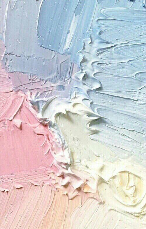 a close up of an abstract painting with brushstrokes in pastel colors. the colors used are white, pink and light blue. the painting is textured and appears to be painted on canvas. the image can be used as a background or wallpaper.