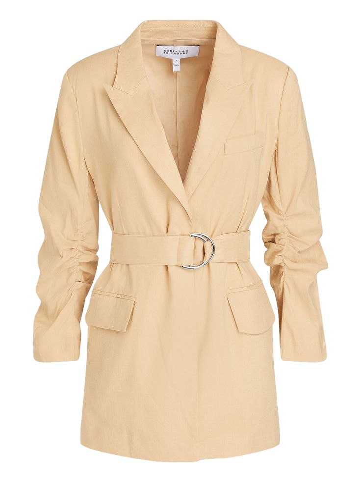 a light beige belted blazer dress with ruched sleeves is displayed against a white background.