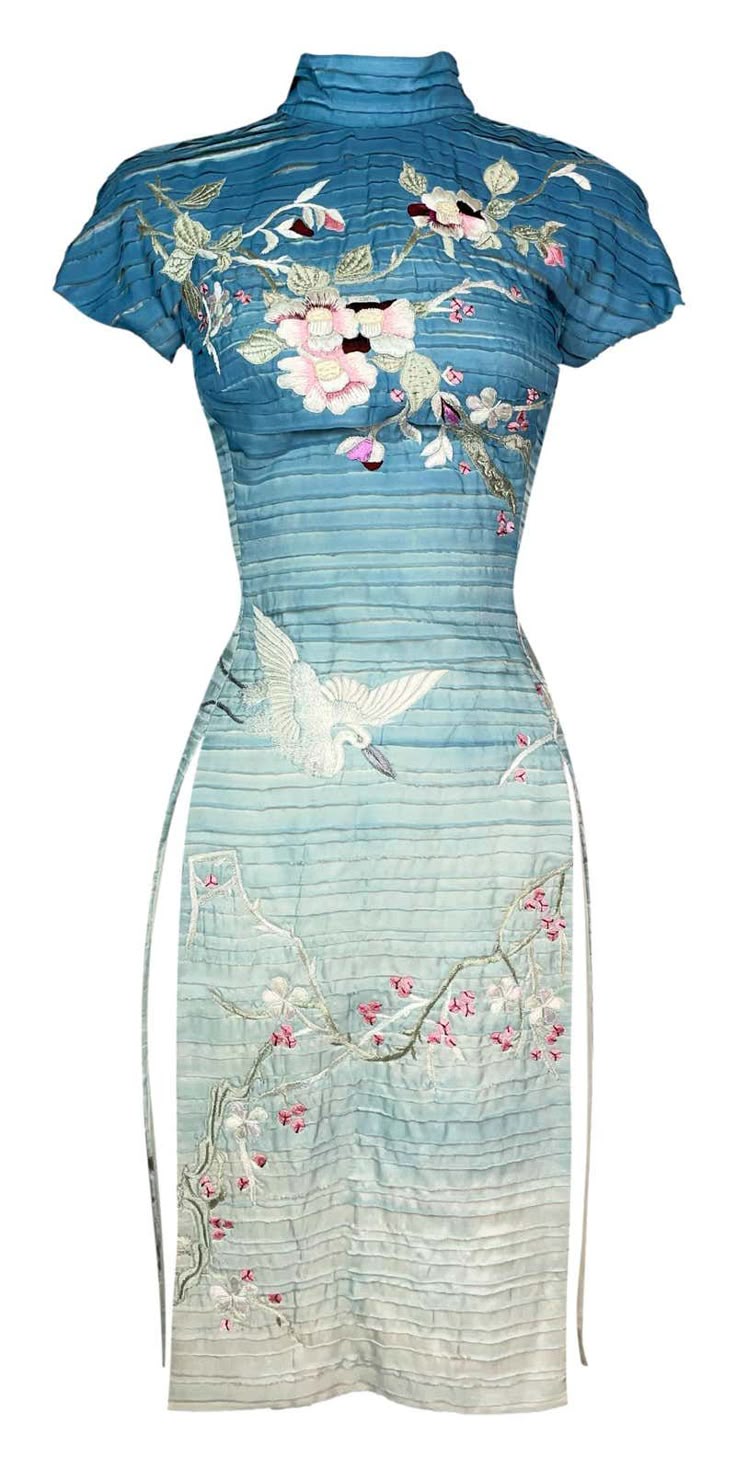 a blue cheongsam dress with floral embroidery and a crane design. the dress has a high collar and a side slit.