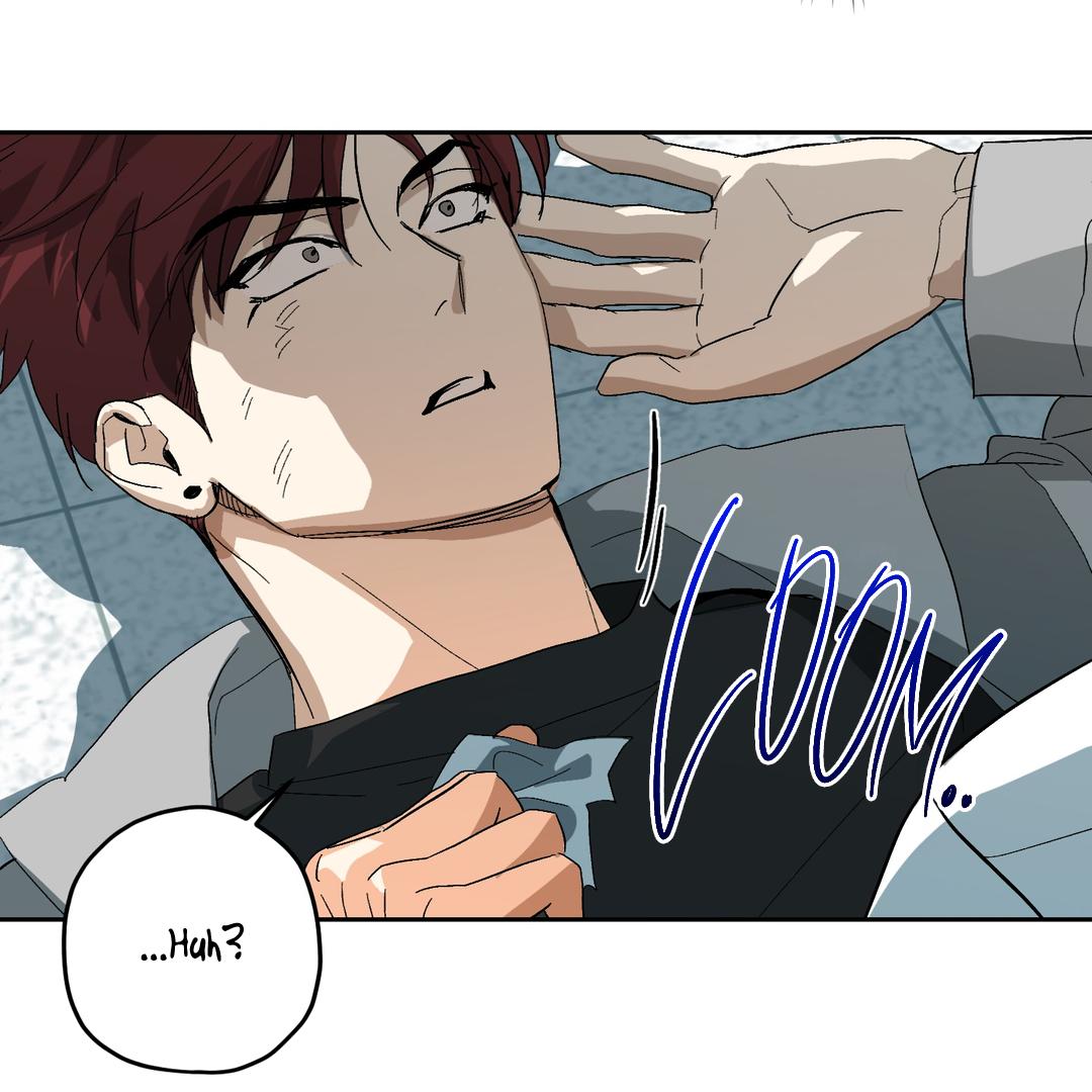 the image is a panel from a manhwa (korean comic). it shows a young man with reddishbrown hair lying down, looking surprised or shocked. he has a slight injury or wound on his face, and is clutching a piece of light blue cloth.  a hand is visible near his face. the background is mainly dark gray and teal.  a sound effect, "loom...", suggests a sudden impact or a loud sound. the speech bubble contains "...huh?", expressing his confusion or bewilderment. the art style is typical of a modern manhwa, with sharp lines and expressive characters. the overall mood is suspenseful or dramatic.