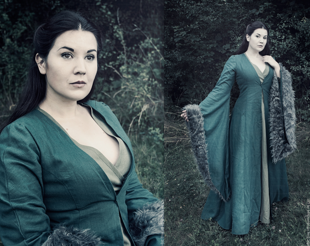 a composite image shows a woman in medievalinspired cosplay. on the left, a closeup portrait reveals her from the chest up, wearing a deep green gown with fur trim around the wrists. the gown has a low vneck, exposing a glimpse of a lighter green underdress. on the right, a fulllength shot shows her standing in a grassy field surrounded by trees. she's wearing the same green gown with its wide sleeves and a fur stole draped over her shoulder. the dark forest setting adds to the fantasy aesthetic.