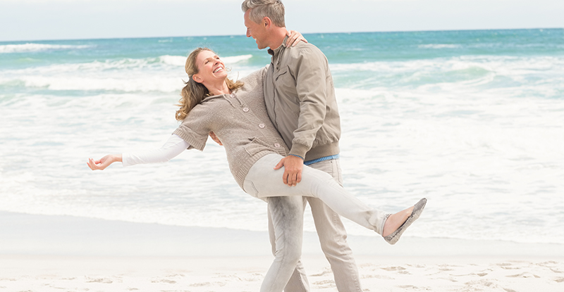 A couple relaxing on a cold day by the water in Wonder Lake, Illinois