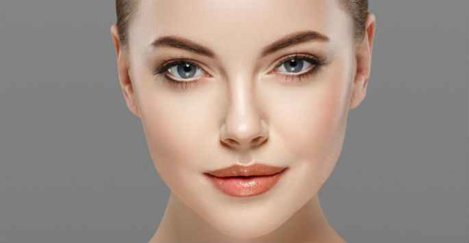 Close up of model's flawless skin and makeup