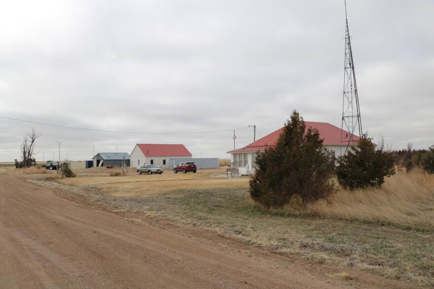 A group of wind turbines generate renewable energy behind a farm in Peetz, Colo. on March 14, 2024. Wind farms have become part of the scenery in many parts of eastern Colorado.