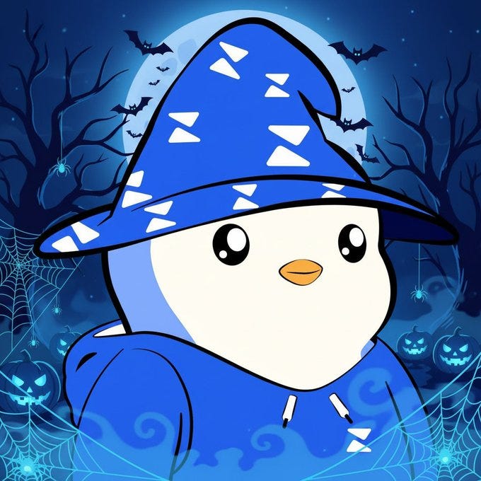 A cartoon white penguin with big eyes and a small beak wears a blue wizard hat with white patterns and a matching blue hooded robe. It stands in a dark night scene under a full moon with twisted bare trees silhouettes bats flying spider webs draped around and orange pumpkins with carved faces at the base. Misty fog swirls in the background enhancing the spooky Halloween atmosphere.