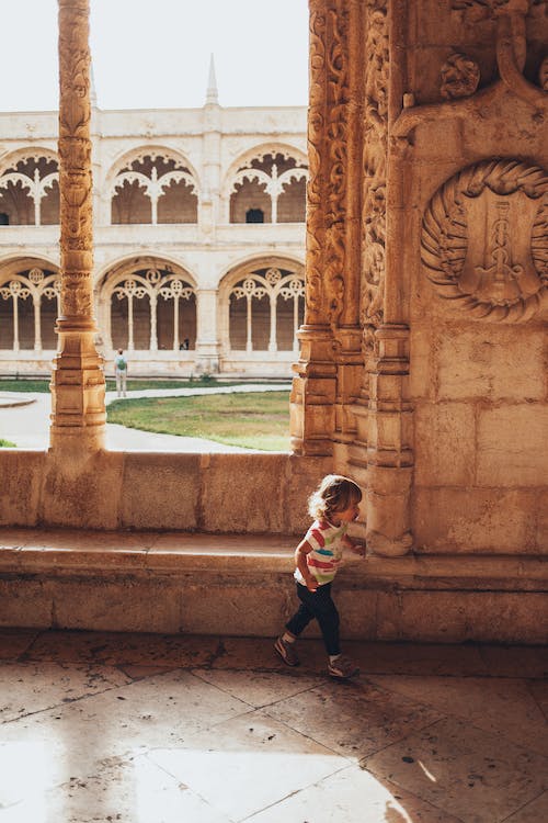 Free Girl Running Inside A Building Stock Photo