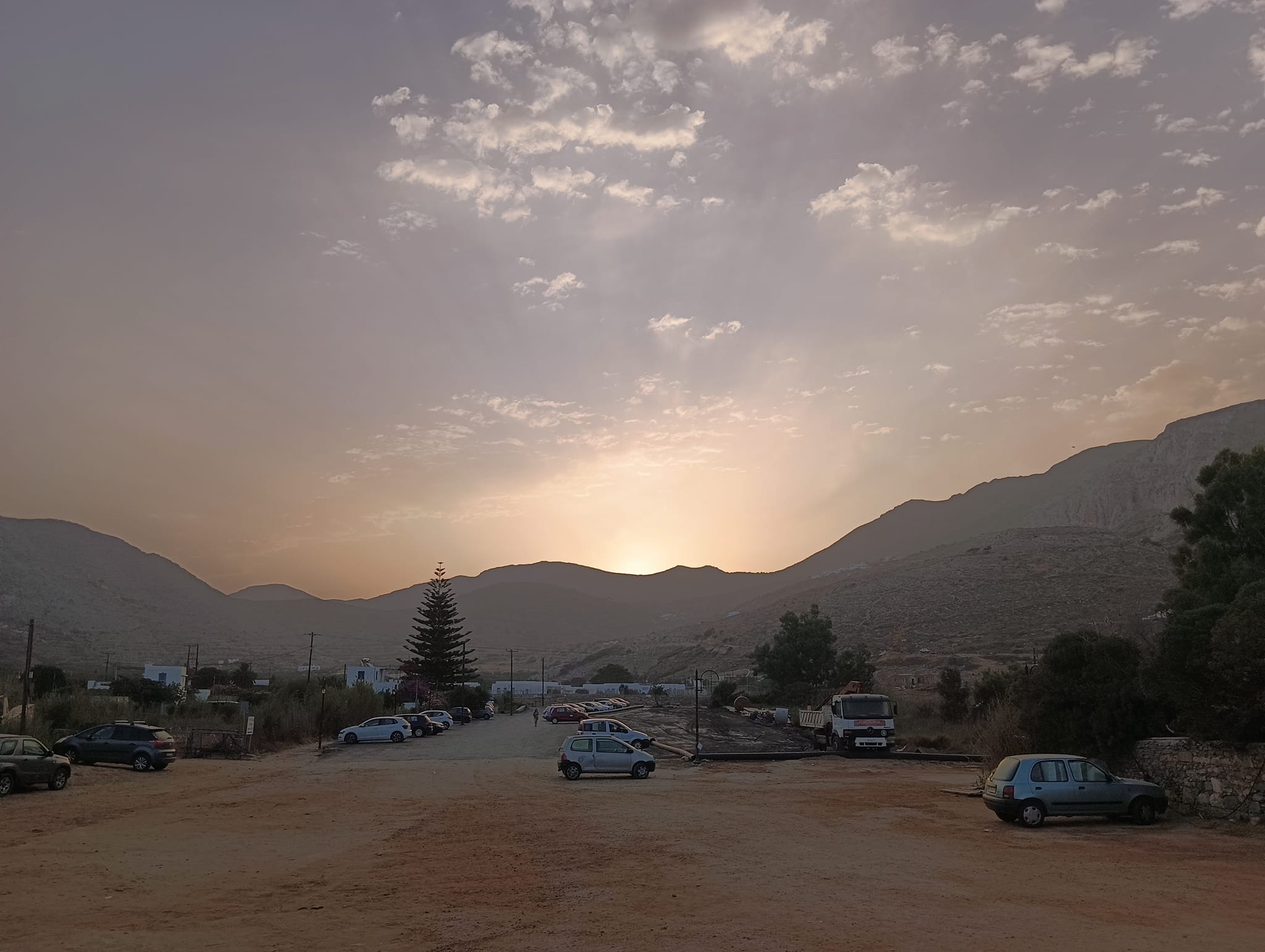 May be an image of campsite, road, fog, mountain, twilight and horizon