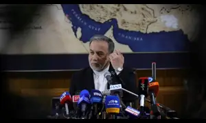 Iranian and Pakistani flags, symbolizing diplomatic relations.