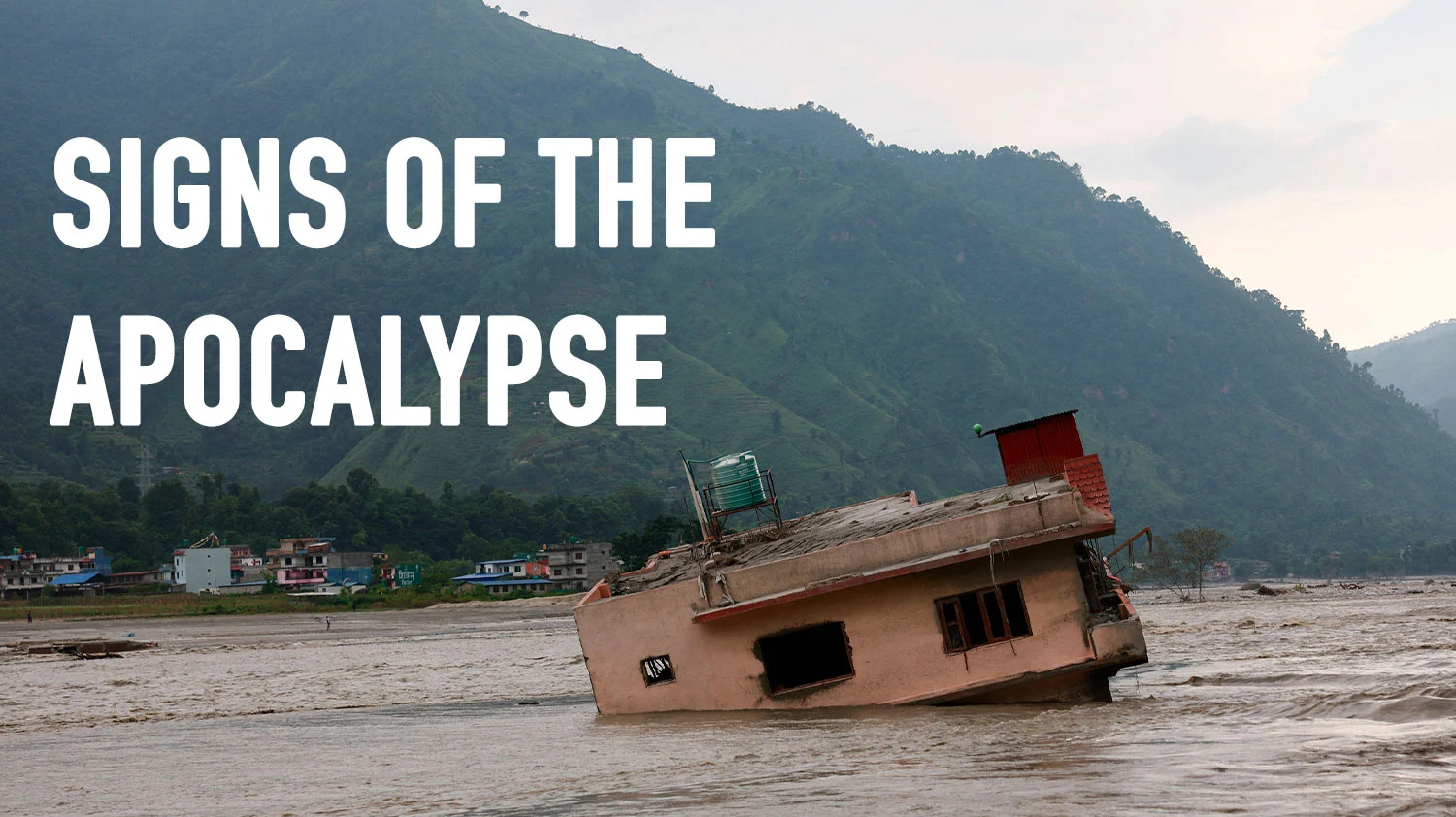 A landscape scarred by a massive mudslide in Nepal following a glacier collapse.