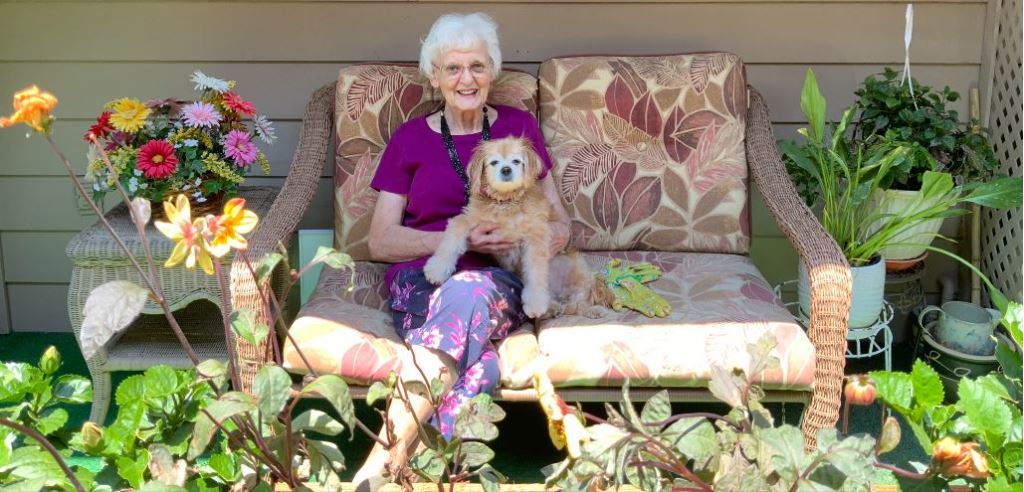 a resident with her dog