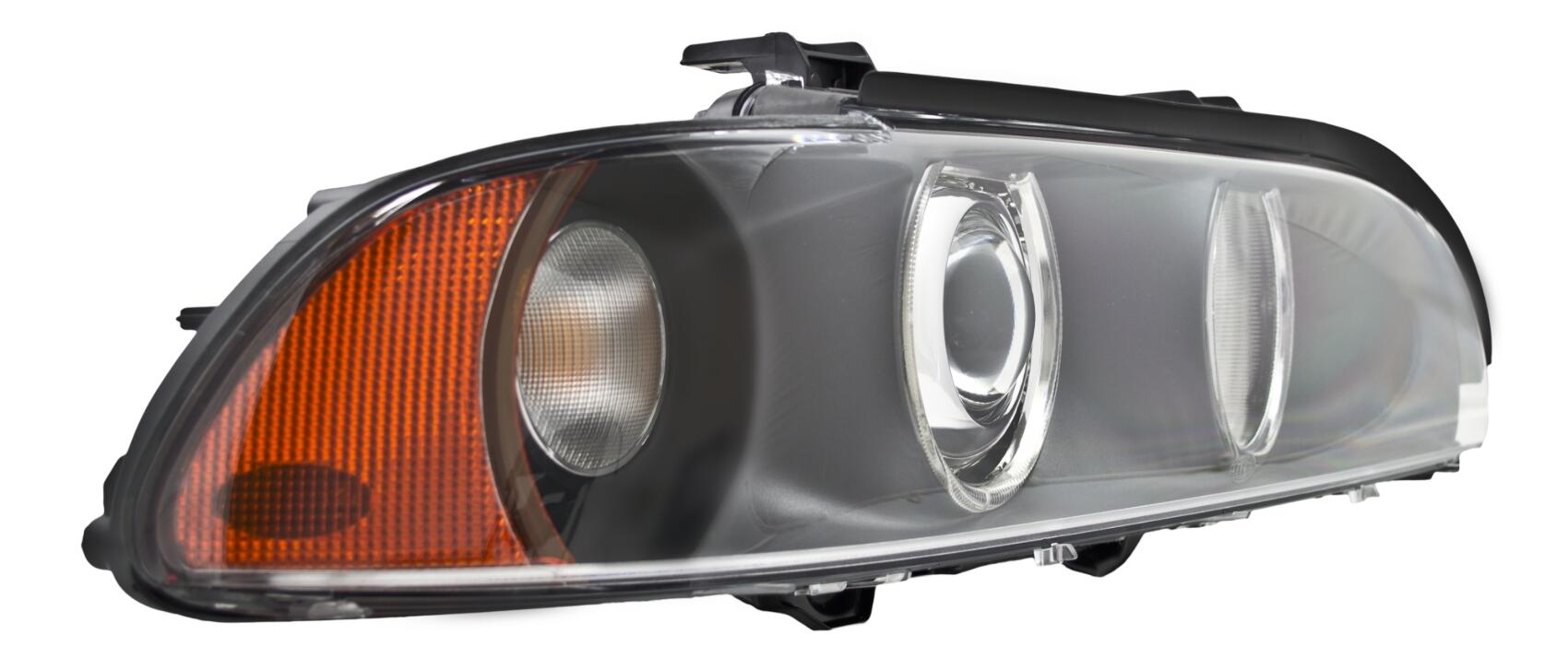 BMW Headlight Assembly - Passenger Side (Xenon) (w/ Clear Turnsignal) 63126912440 - Hella 008052121