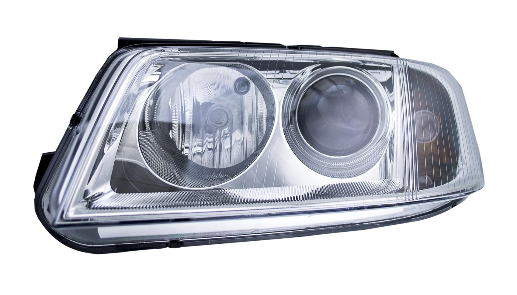 VW Headlight Assembly - Driver Side (Halogen) 3B0941015AQ - Hella 008350051