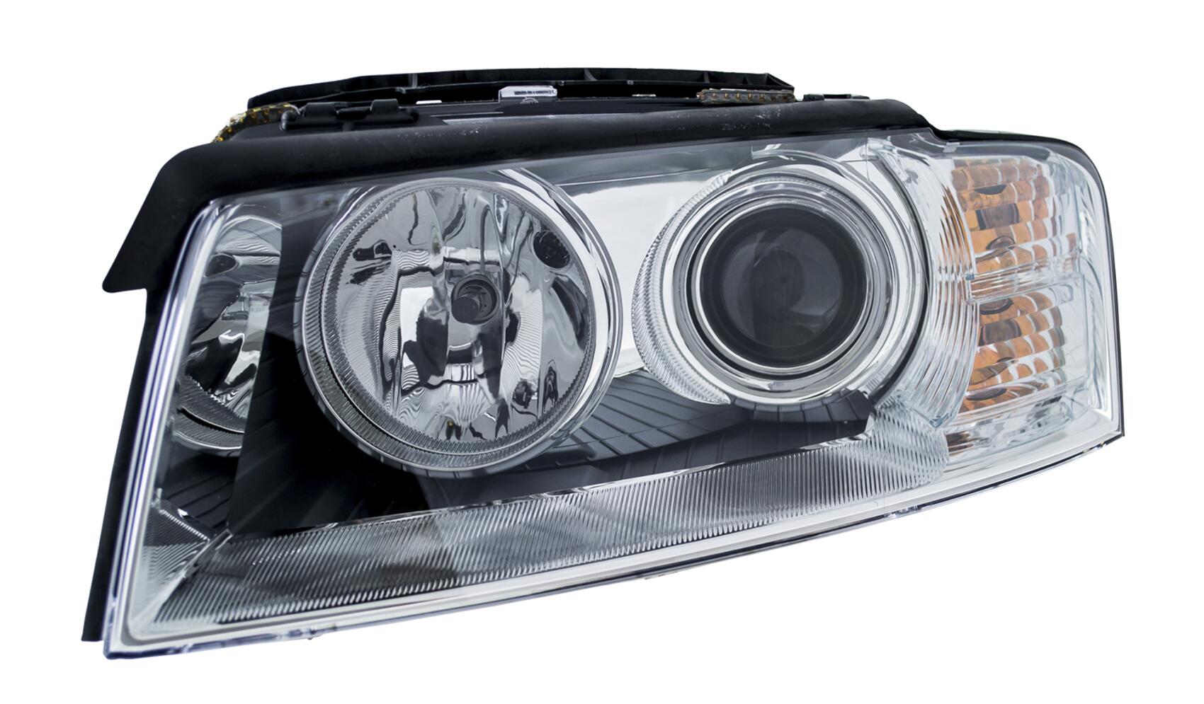 Audi Headlight Assembly - Driver Side (Xenon) (Adaptive) 4E0941029P - Hella 008540551