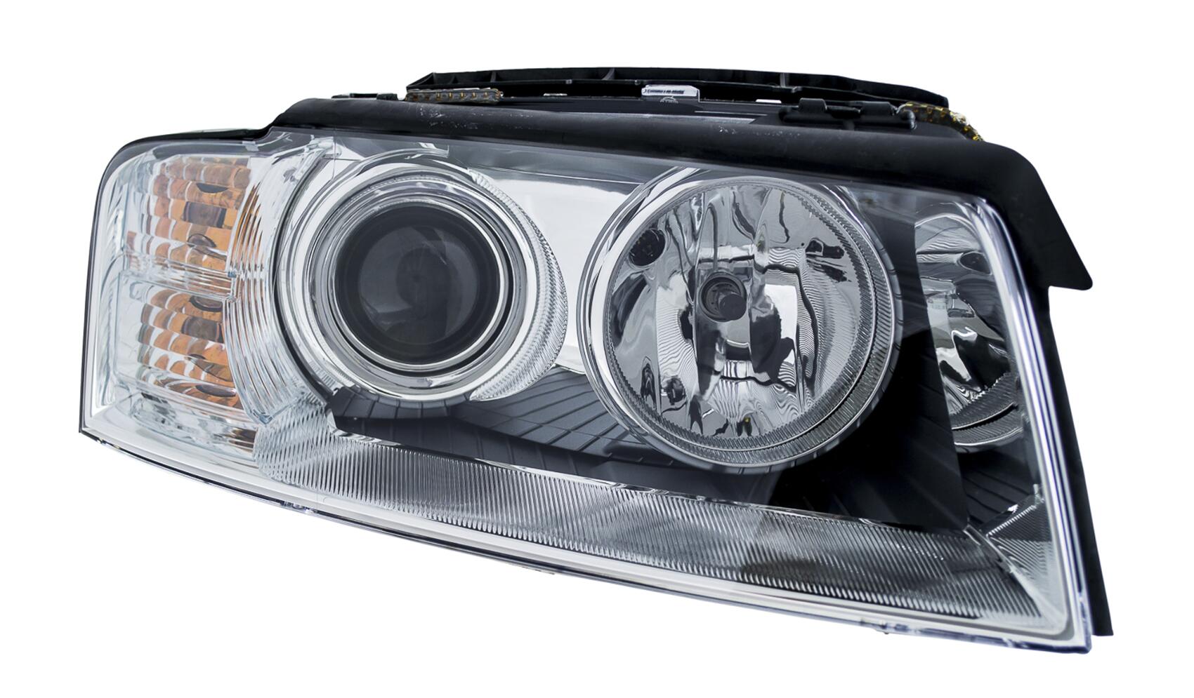 Audi Headlight Assembly - Passenger Side (Xenon) (Adaptive) 4E0941030P - Hella 008540561