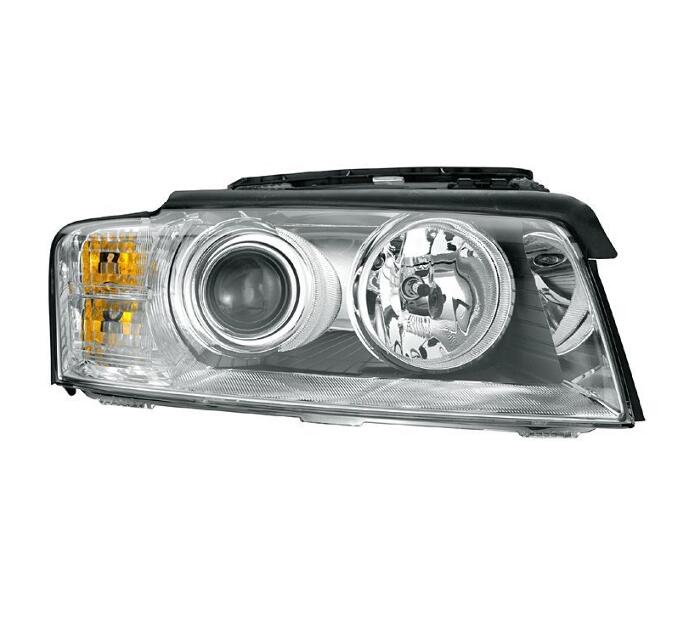 Audi Headlight Assembly - Passenger Side (Xenon) (Adaptive) 4E0941030P - Hella 008540561