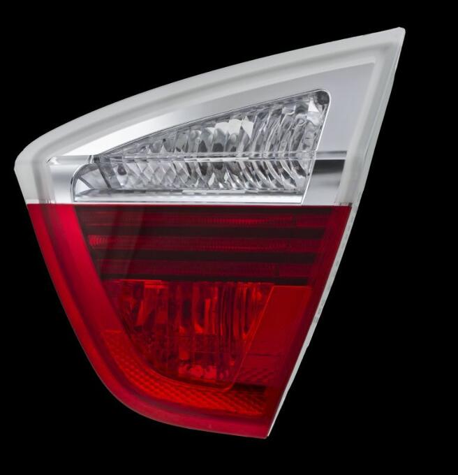 BMW Tail Light Assembly - Passenger Side Inner 63216937460 - Hella 010083041