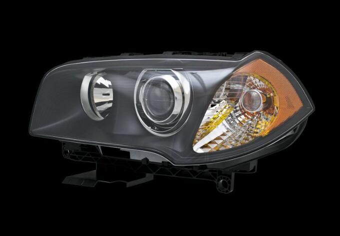 BMW Headlight Assembly - Driver Side (Xenon) 63123418397 - Hella 010166011