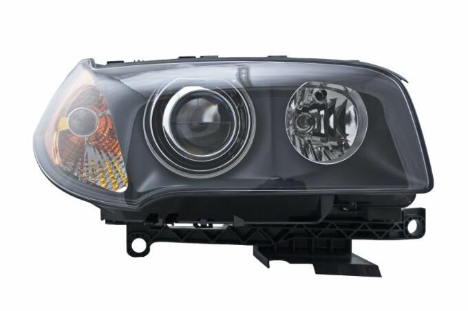 BMW Headlight Assembly - Passenger Side (Xenon) 63123418398 - Hella 010166021