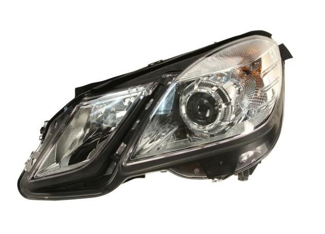 Mercedes Headlight Assembly - Driver Side (Halogen) 2128209561 - Hella 010800071