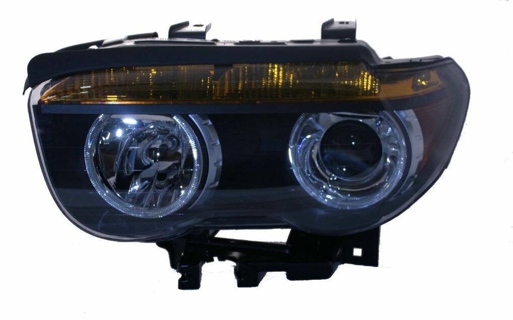 BMW Headlight Assembly - Driver Side (Xenon) 63127165449 - Hella 158079006