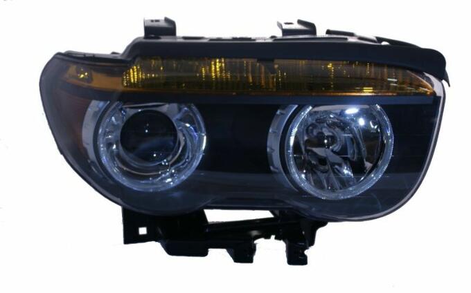 BMW Headlight Assembly - Passenger Side (Xenon) 63127165450 - Hella 158080006