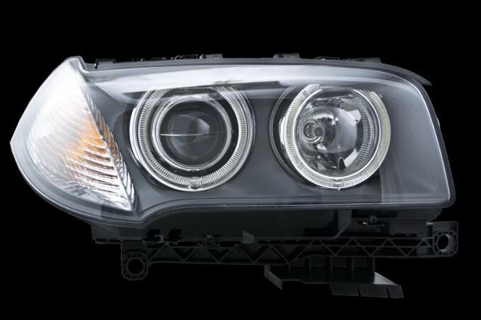 BMW Headlight Assembly - Passenger Side (Xenon) (Adaptive) 63123456046 - Hella 354415121