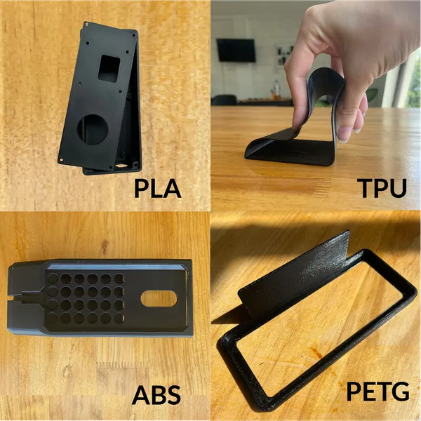 Comparativa de piezas negras impresas en PLA, TPU flexible, ABS y PETG