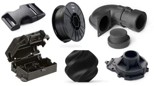 Carrete de filamento negro y piezas funcionales impresas en nylon con fibra de carbono: hebilla, codo, carcasa y brida